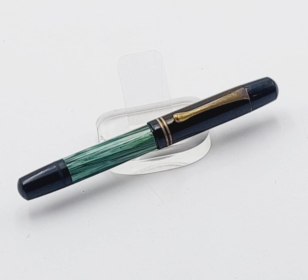 The old pelican 100 piston filler holder with spring holder CN